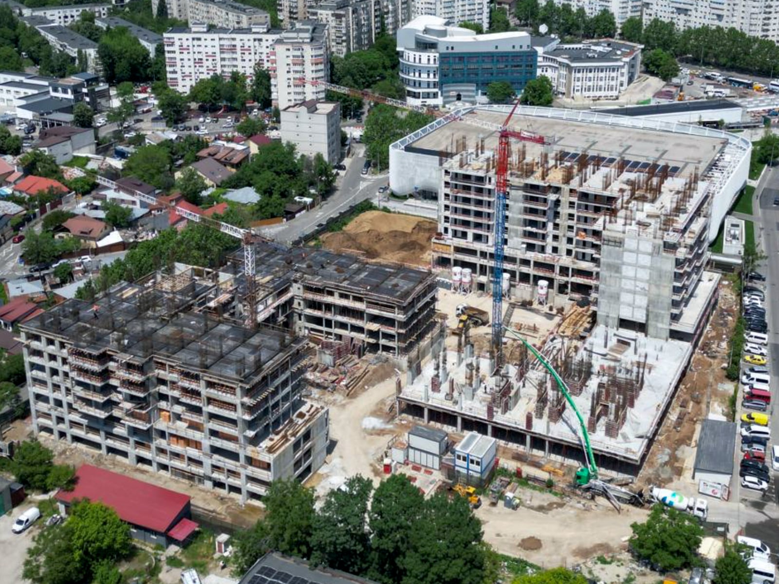 Aerial view of the Venus Arena Residence construction site in Bucharest, with several buildings under way and tower cranes